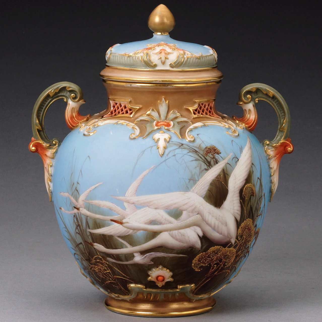 Royal Worcester covered jar hand painted with swans by Charles Baldwyn