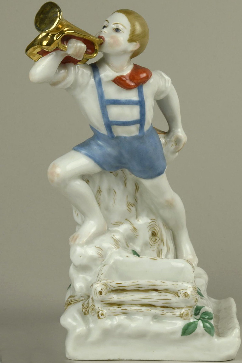 Soviet Propaganda Porcelain figure of a young pioneer blowing the horn by Maria Strakhovskaya