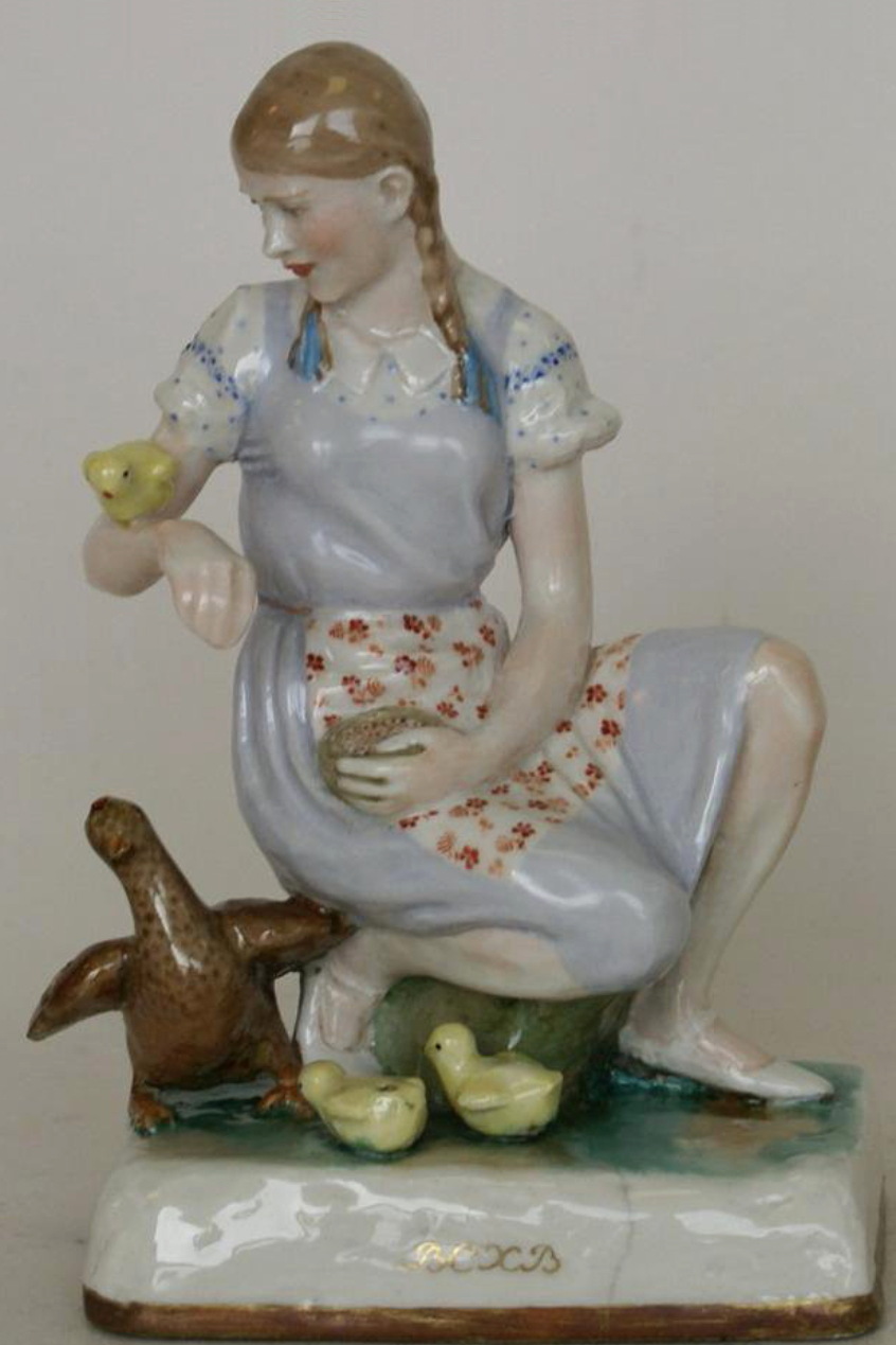 Lomonosov Soviet porcelain figural group "Girl with birds" by Kazimir Rizhov