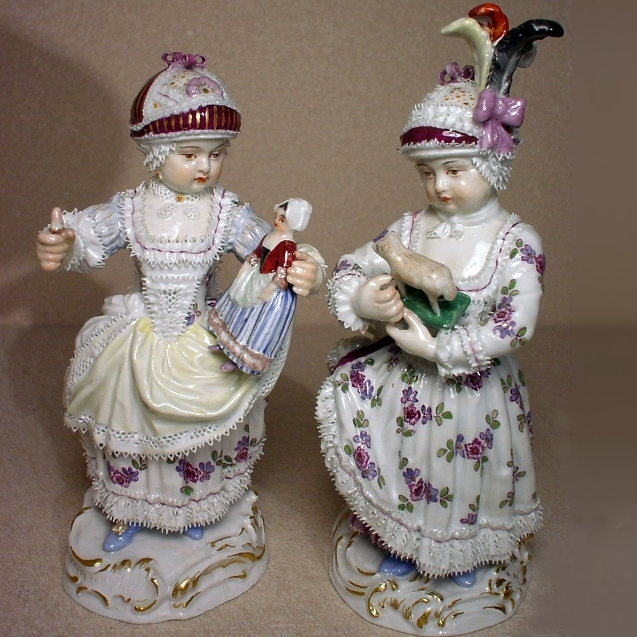 Meissen figures of Girls with the doll and the toy. Model numbers C79 and C90