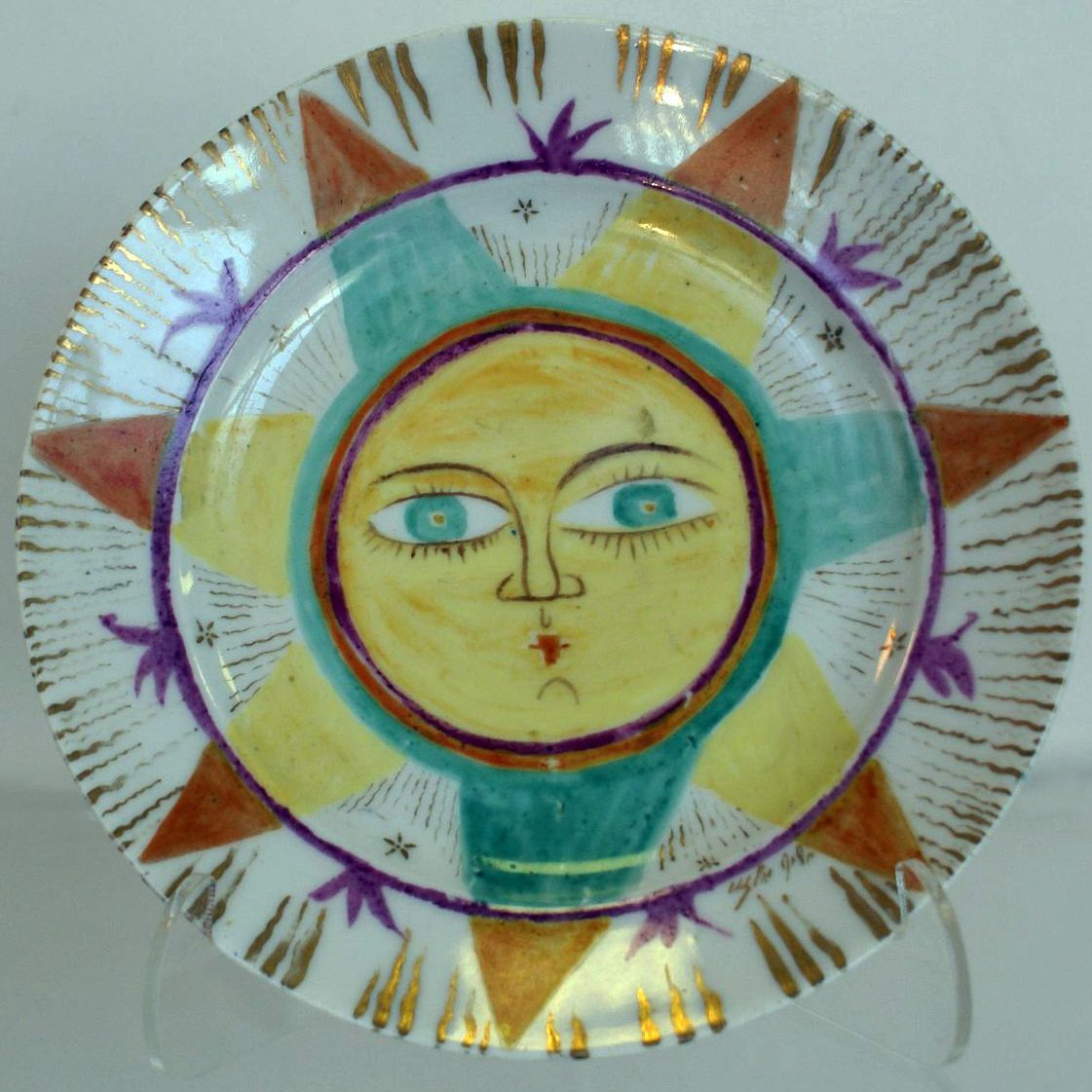 Small Soviet porcelain plate "The Sun" by Shchekotikhina-Pototskaya. State Porcelain Factory