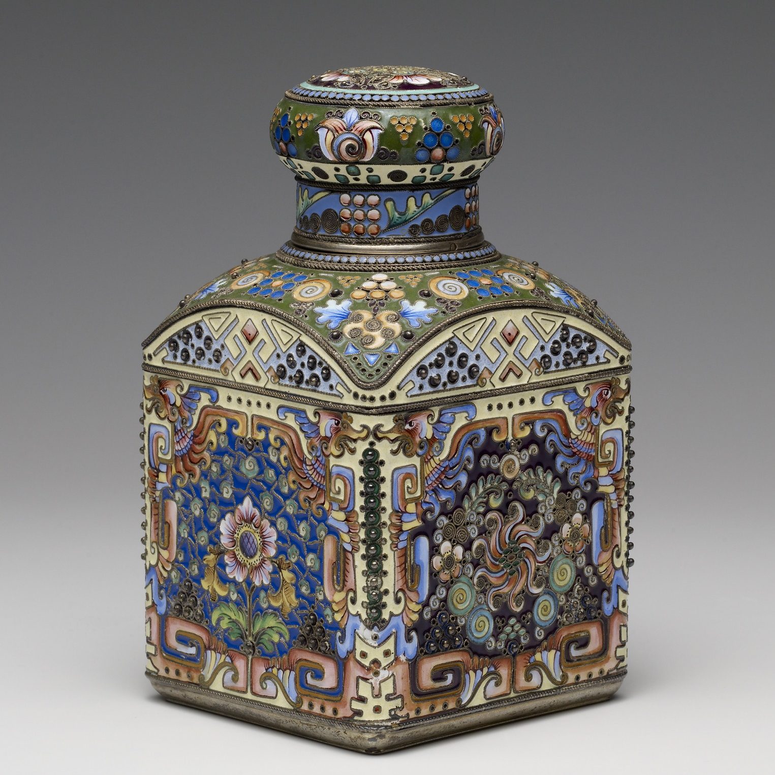 Coffee Caddy with Chinese-inspired decoration by 11th Artel. Silver enamel.