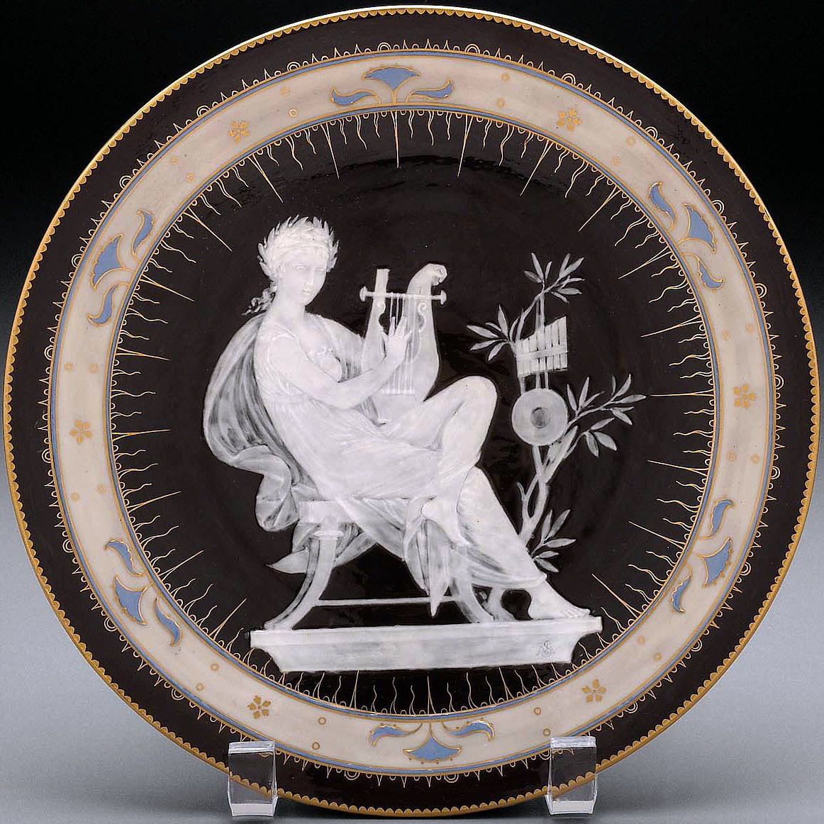 Minton pate-sur-pate plate signed Solon depicting a young woman playing the harp