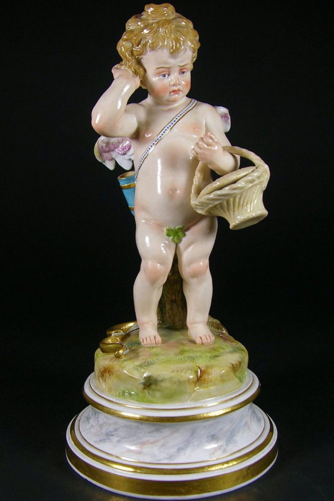 Meissen cupid with a basket. Model number L118