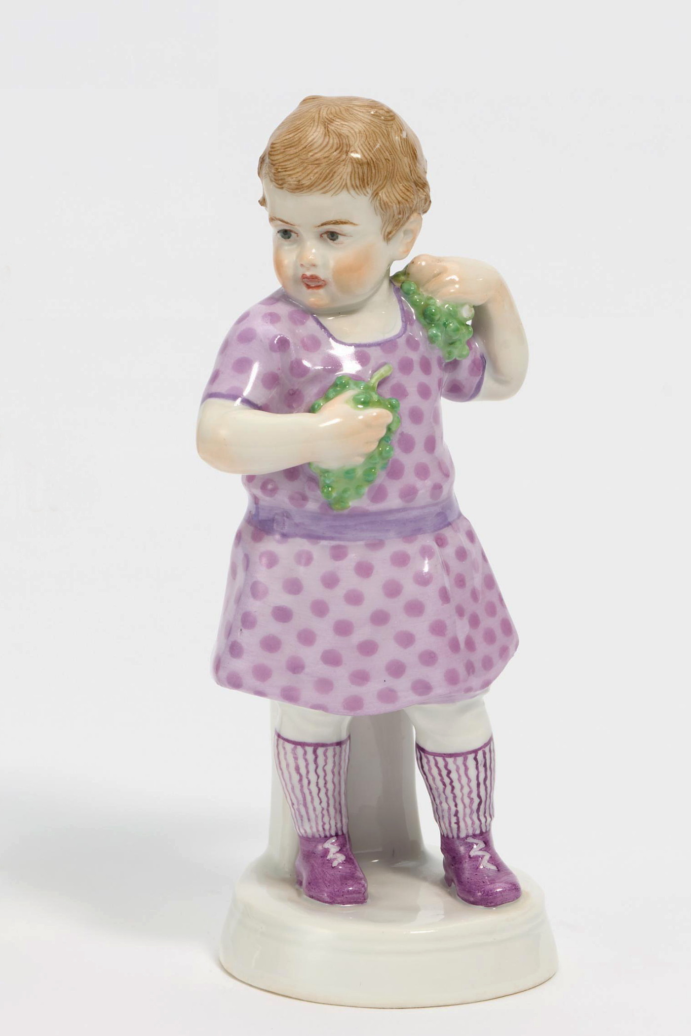 Meissen girl with grapes by Alfred Konig. Model number F215