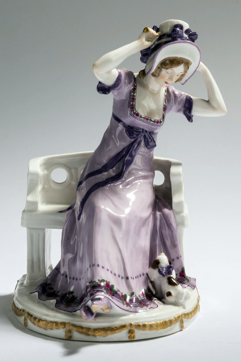 Meissen lady with a puppy by Alfred Konig. Model number A258