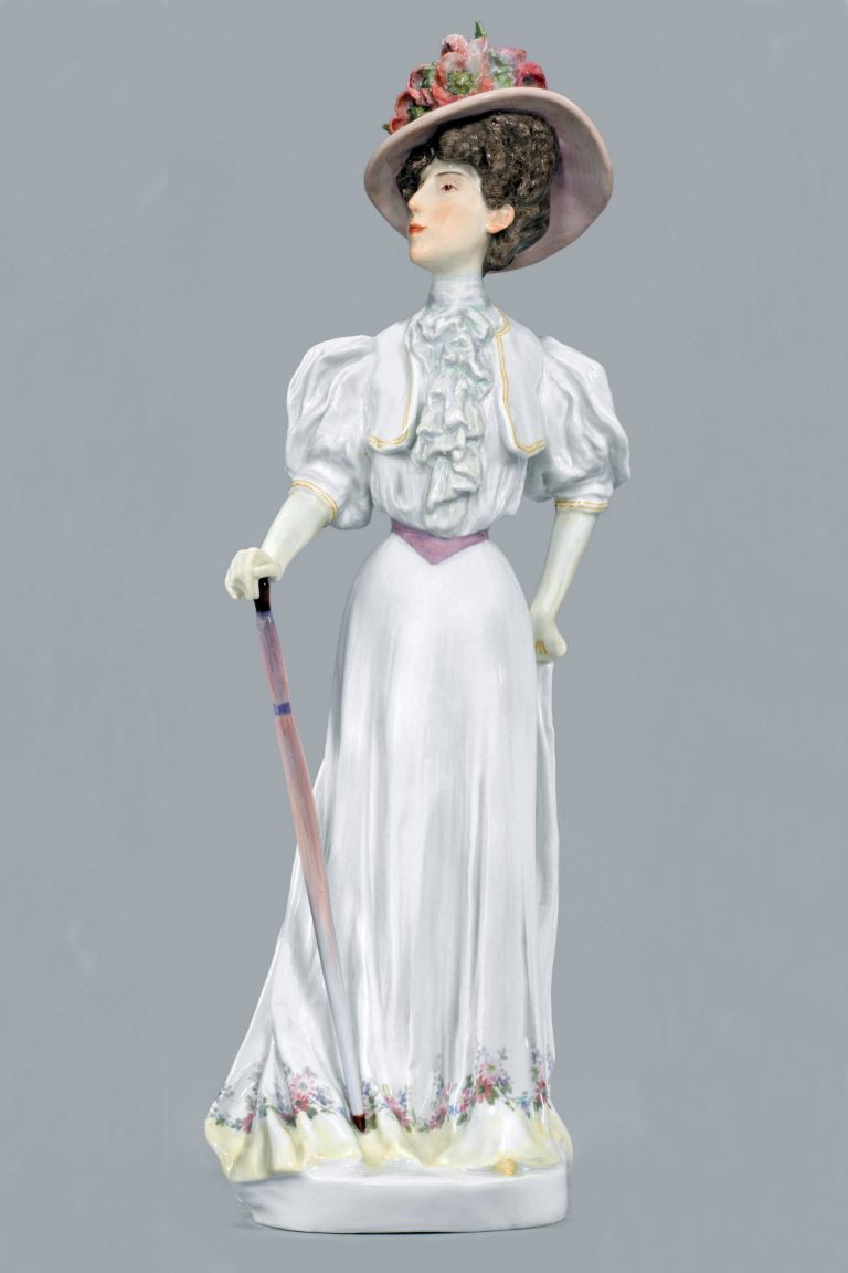 Meissen figure of Parisian Woman with a cane. Model number Y110 by Theodor Eichler