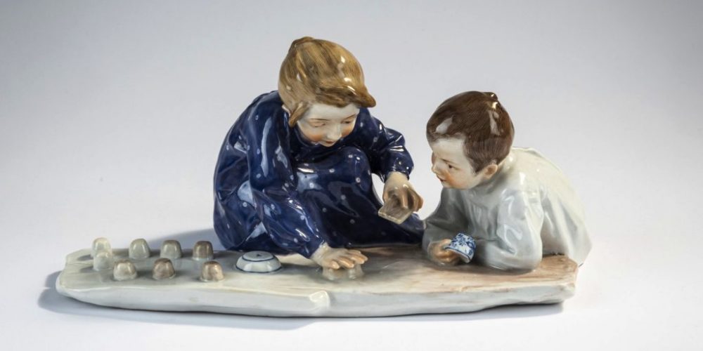 Meissen Hentschel figural group of two children playing with sand forms. Model number W165