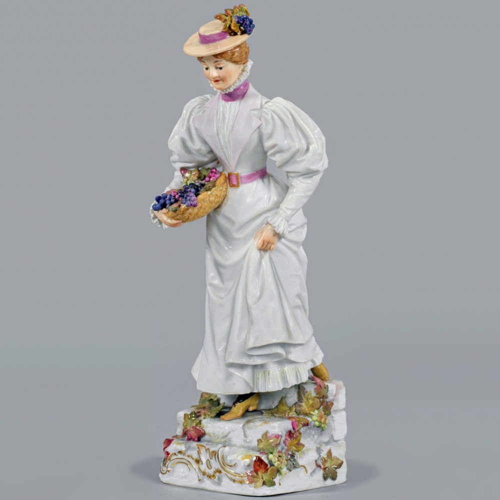 Meissen figure "At the vineyard". Lady with grapes. Model number Q171 by Emmerich Andresen.