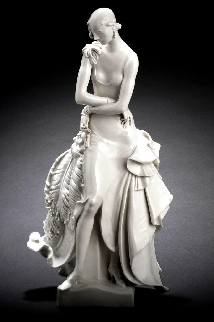 Meissen figure of a lady with a feather fan. Model number A1224 by Paul Scheurich