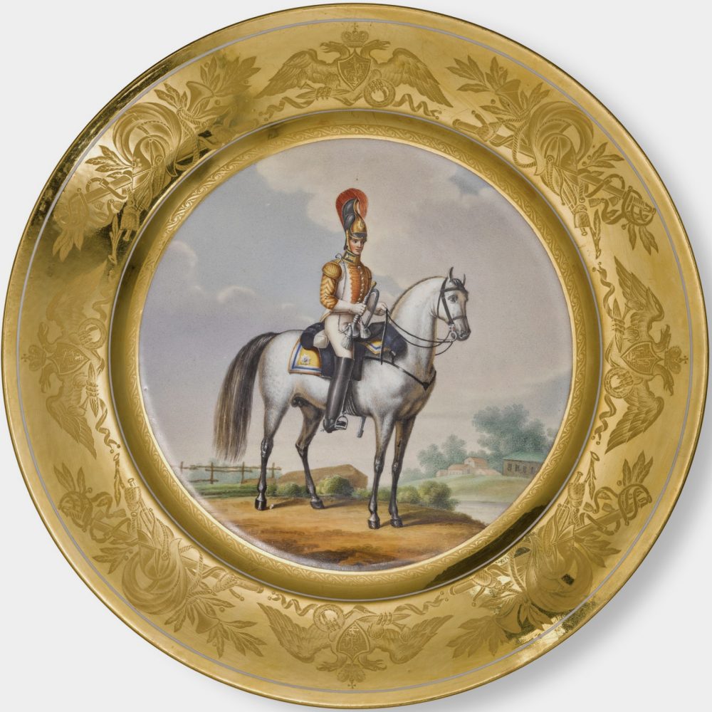 Russian Imperial Porcelain military plate depicting Podolie Cuirassier Trumpeter