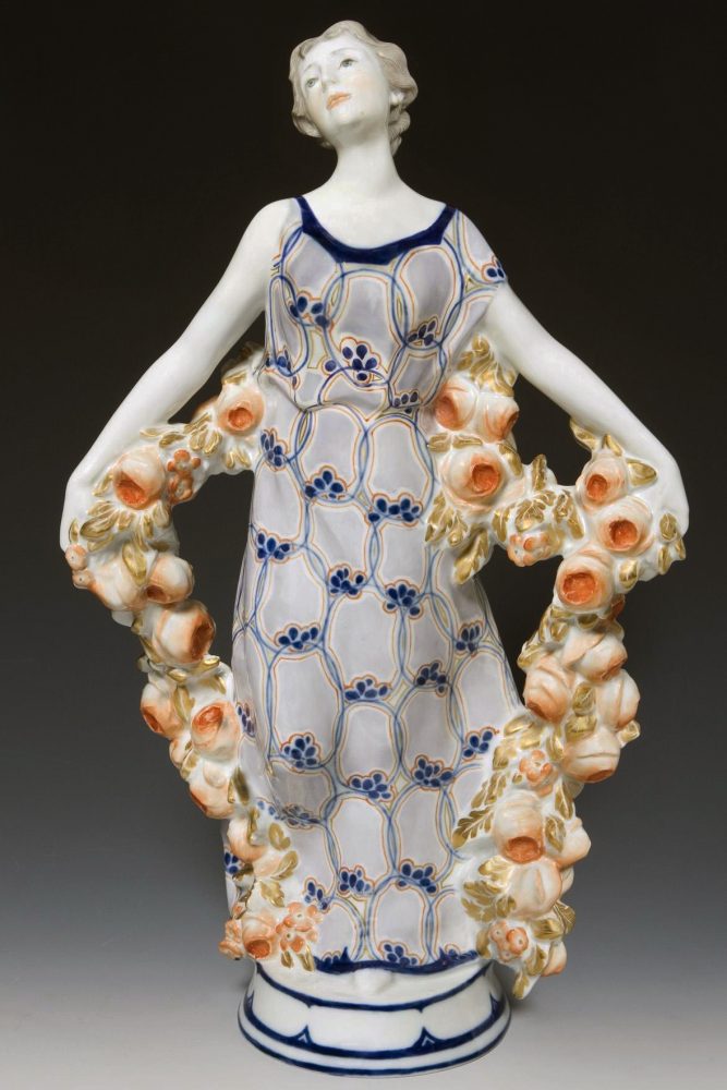 Meissen figure of Girl with roses by Theodor Eichler. Model A250/8