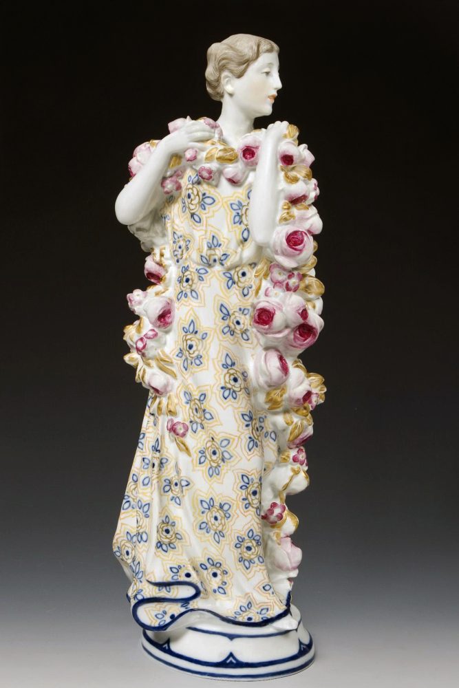 Meissen figure of Girl with roses by Theodor Eichler. Model A250/8