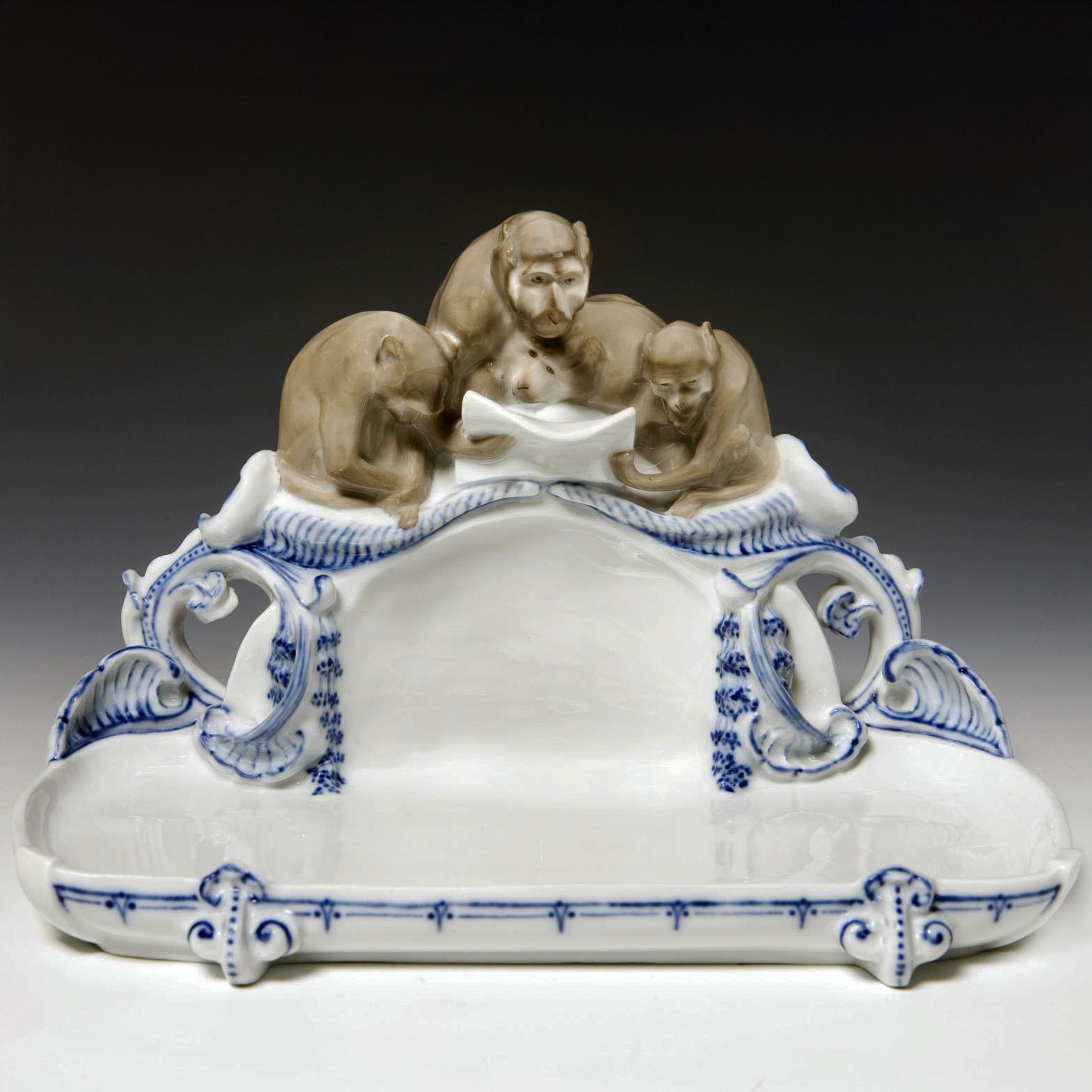 Meissen porcelain inkstand with a figural group of monkeys on top. Modeled by Max Bochmann. Model number W179