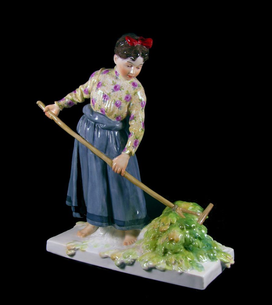 Meissen figure Girl Raking Leaves. Model number X182