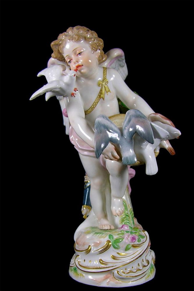 Meissen figure of cupid with doves. Model number R 122