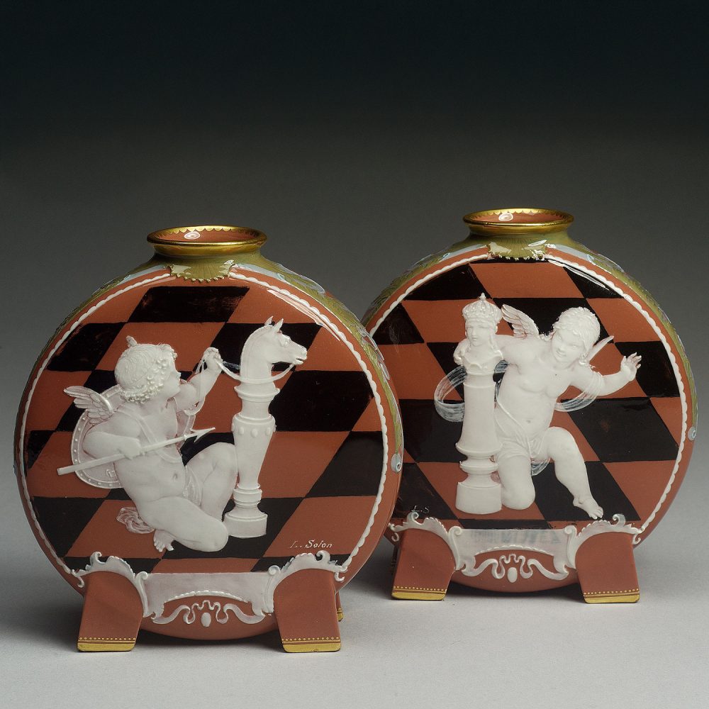 Pair of Small Minton Pate-Sur-Pate flasks 1303. Chess. Cupids. Louis Solon.