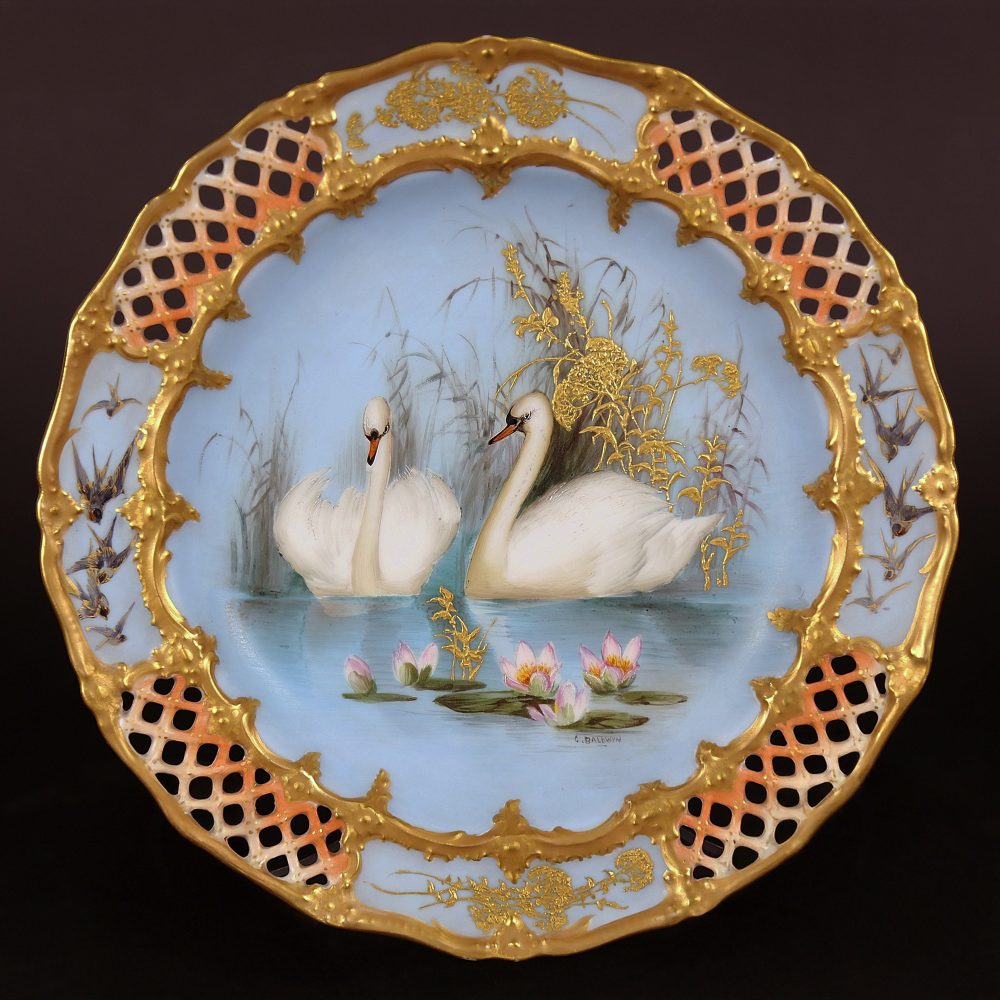 Royal Worcester plate hand painted with swans by Charles Baldwyn