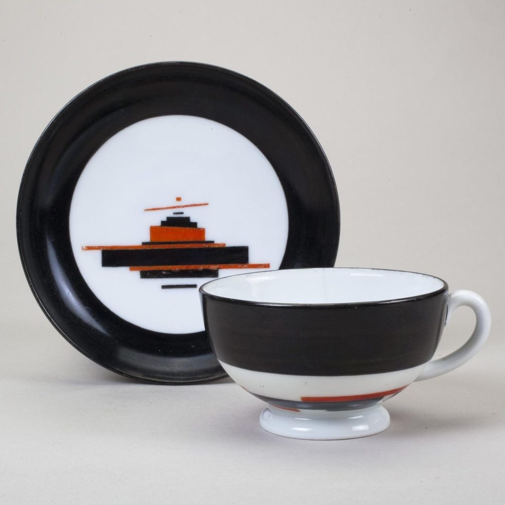 Soviet porcelain cup and saucer Suprematism after Ilya Chashnik. Lomonosov State Porcelain factory, St Petersburg, USSR. Circa 1923