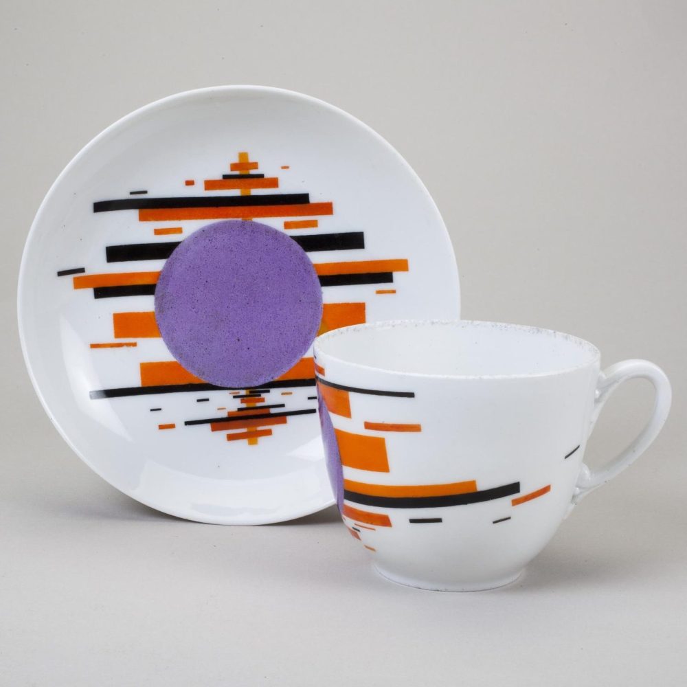 Soviet porcelain cup and saucer Suprematism after Ilya Chashnik. Lomonosov State Porcelain factory, St Petersburg, USSR. Circa 1923